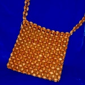 American Outfitter Wooden Bead Bag